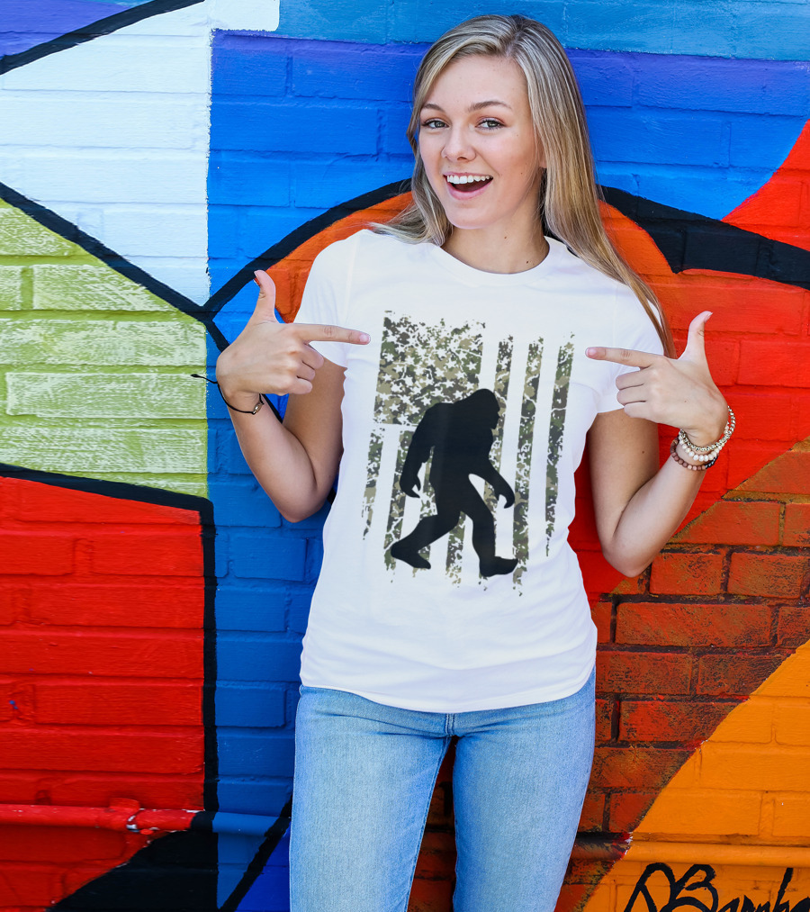 I Believe Bigfoot Sasquatch Camo Flag Patriotic Forest Walk T-Shirt