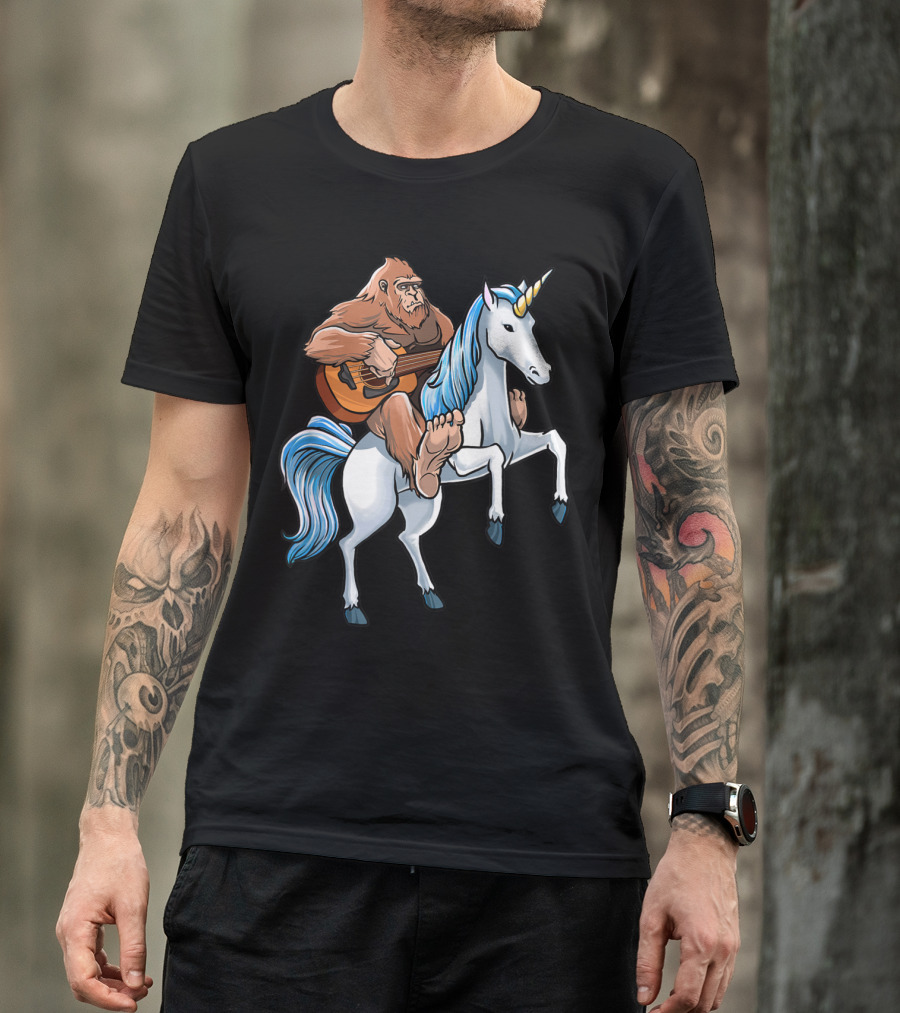 Bigfoot Playing Guitar Riding A Unicorn T-Shirt