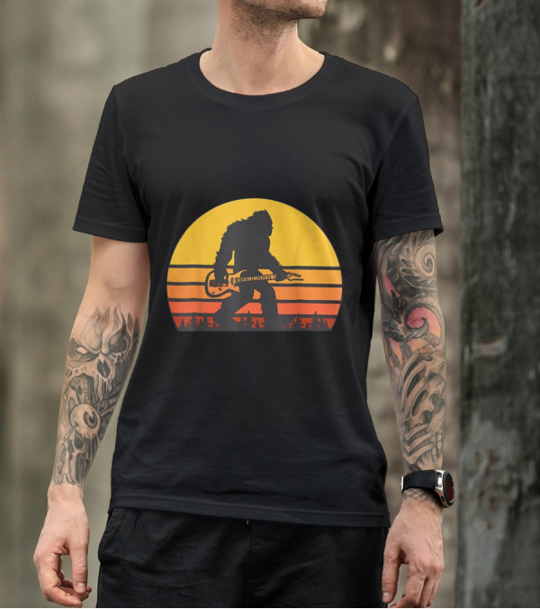 Bigfoot Silhouette Playing Guitar In Sunset Forest Scene T-Shirt