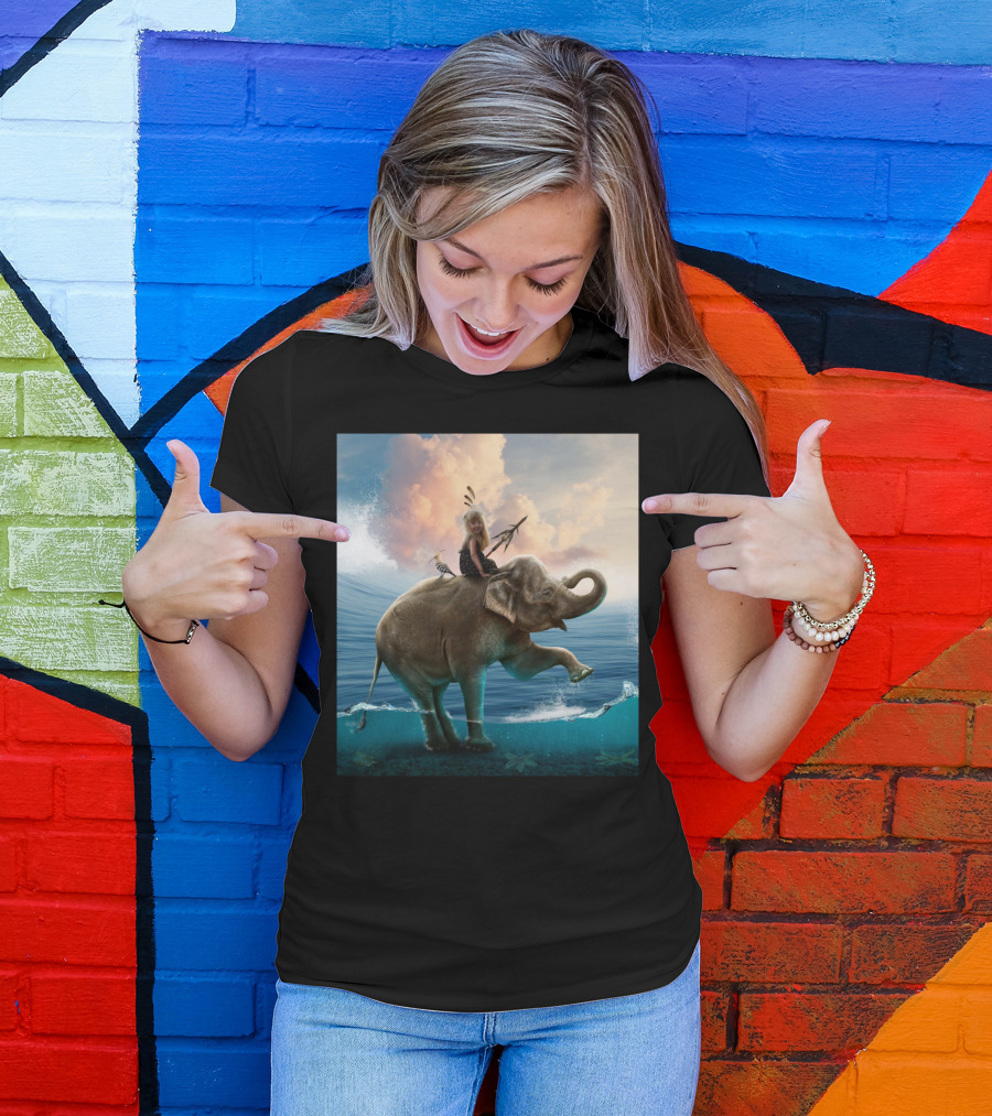 Child With Feathers Riding Elephant In Ocean Waves T-Shirt