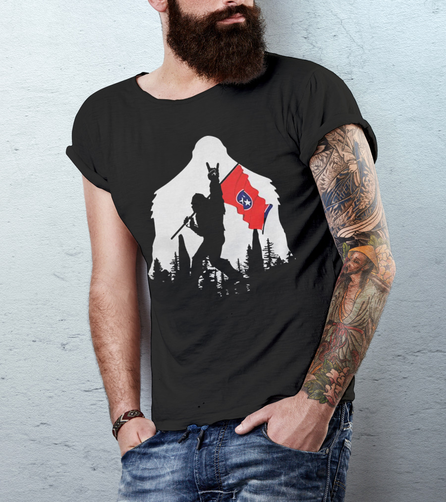 Bigfoot Silhouette With Rock And Roll Pose Holding Tennessee Flag In Forest T-Shirt