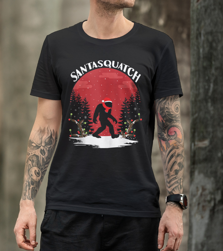 Santasquatch Christmas Funny Bigfoot Santa Hat Snowy Forest Trees T-Shirt