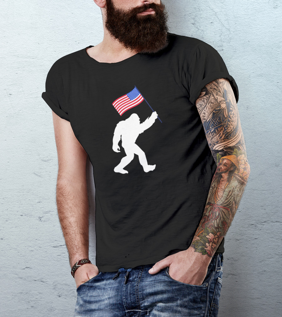 Funny Bigfoot Carrying American Flag For 4th Of July Celebrations T-Shirt