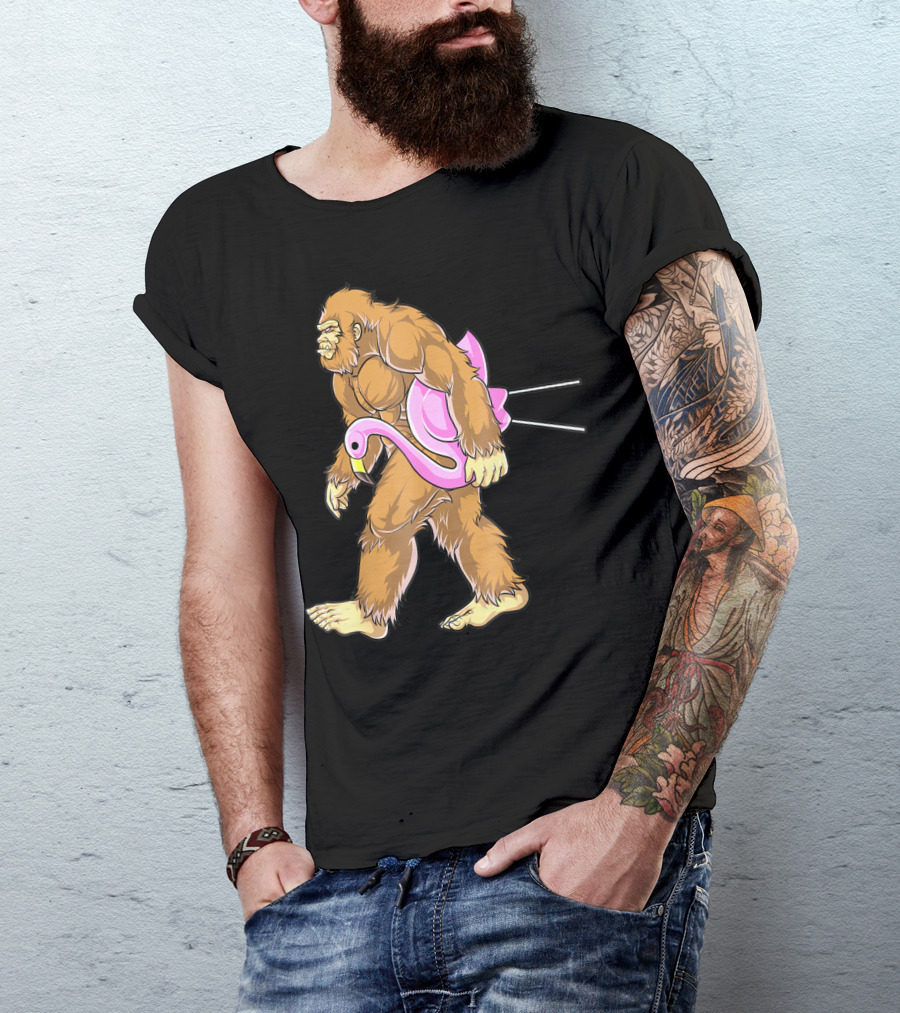 Bigfoot Carrying Pink Lawn Flamingo Humorous Sasquatch Image T-Shirt