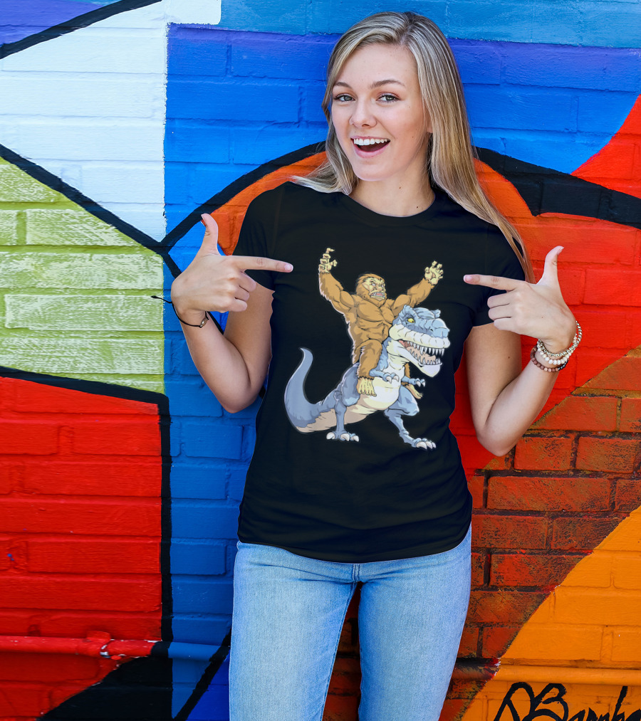 Bigfoot Sasquatch Riding Dinosaur Adventure T-Shirt