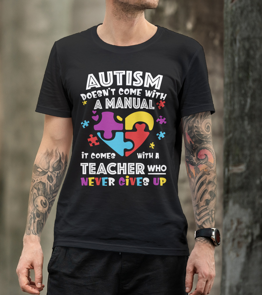 AUTISM DOESN'T COME WITH A MANUAL IT COMES WITH A TEACHER WHO NEVER GIVES UP T-Shirt