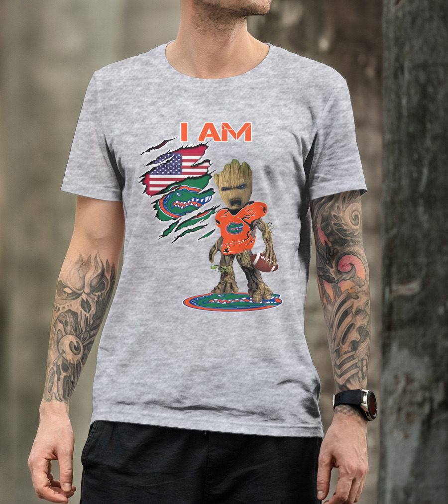 I Am Gators Baby Groot Holding Football With American Flag And Florida Gators T-Shirt