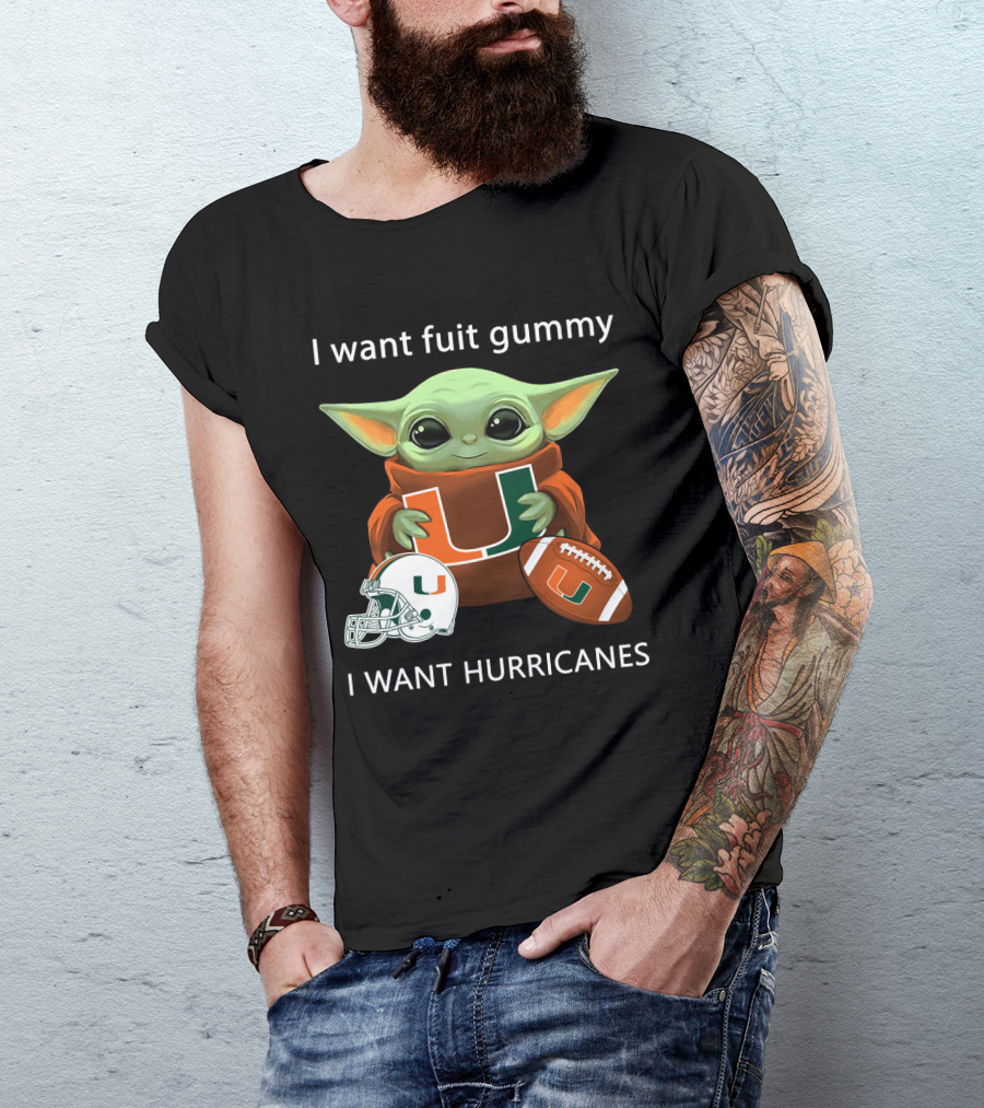 I Want Fuit Gummy I Want Hurricanes Baby Yoda Holding Miami Hurricanes Logo Helmet And Football T-Shirt