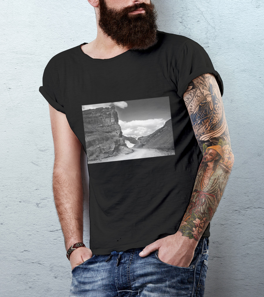 Pang Landscape Serene Mountainous Road Against Majestic Rock Formations And Cloud-Filled Sky T-Shirt