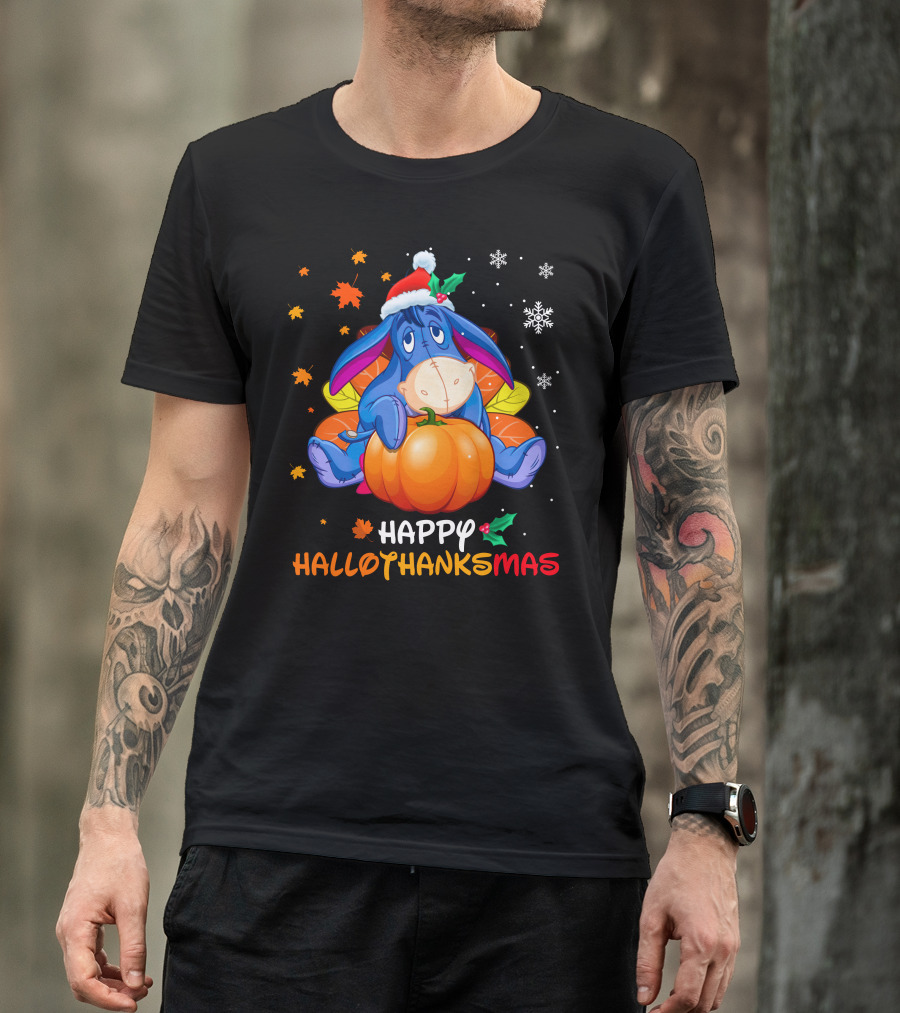 Eeyore Happy Hallothanksmas Sitting On Pumpkin With Santa Hat Snowflakes And Autumn Leaves T-Shirt