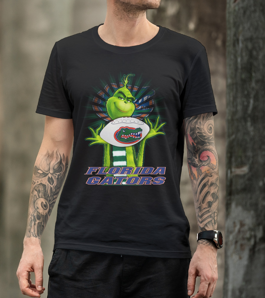 Grinch Holding Florida Gators Football T-Shirt