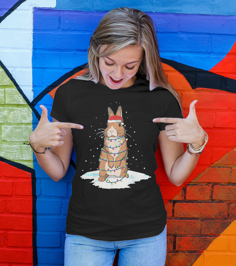 Rabbit Santa Wrapped In Christmas Light Tree With Snow Background T-Shirt