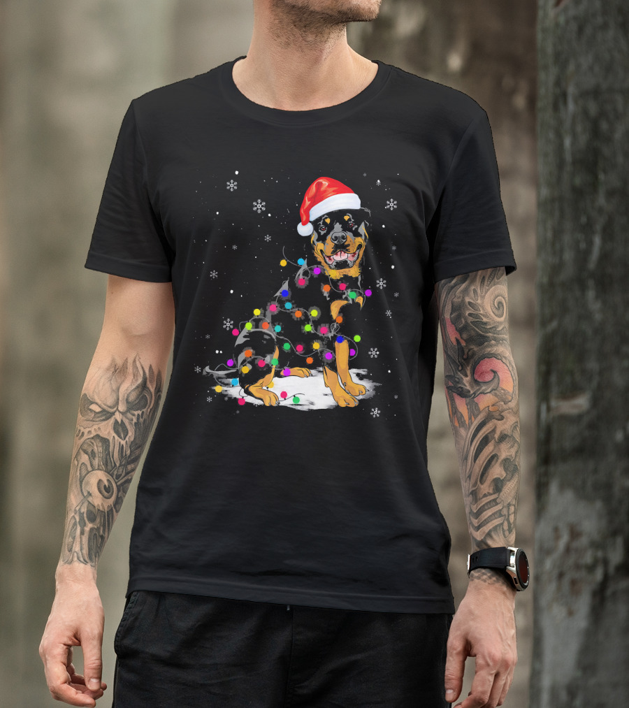 Rottweiler Wearing Santa Hat Wrapped In Colorful Christmas Lights With Snowflakes T-Shirt