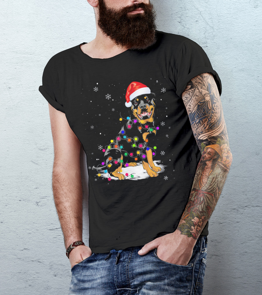 Rottweiler Wearing Santa Hat Wrapped In Colorful Christmas Lights With Snowflakes T-Shirt