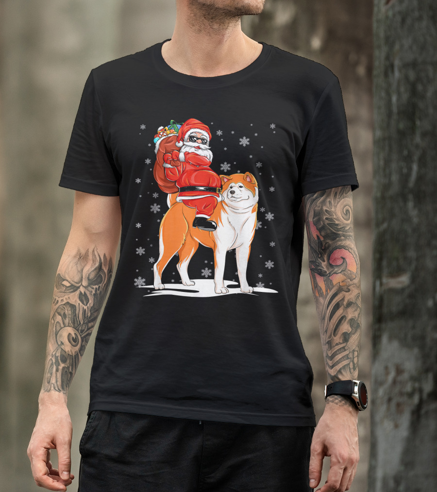 Santa Claus Riding Akita With Snowflakes And Gift Sack T-Shirt
