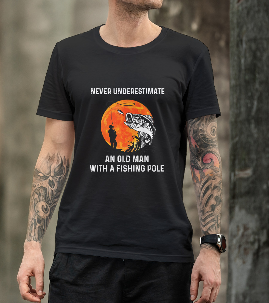 Never Underestimate An Old Man With A Fishing Pole Silhouette Against Orange Moon With Giant Bass T-Shirt