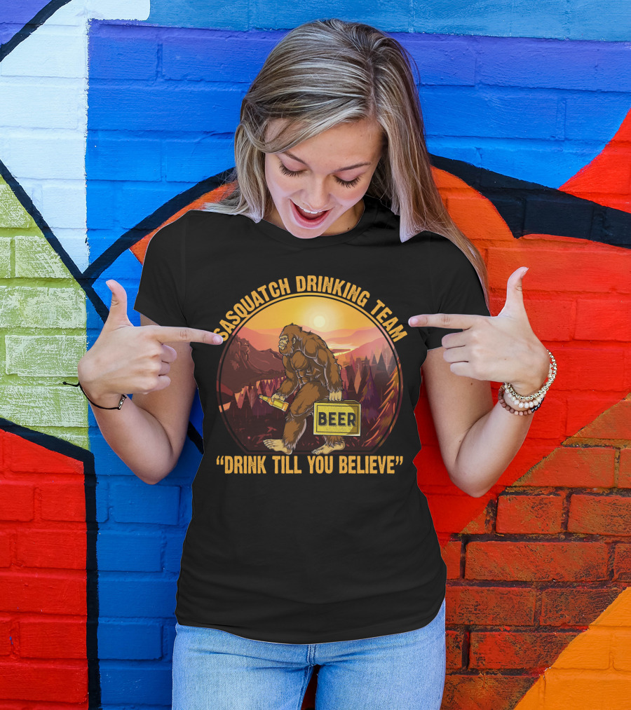 Sasquatch Drinking Team Beer Wilderness Sunset Funny Bigfoot Drink Till You Believe T-Shirt