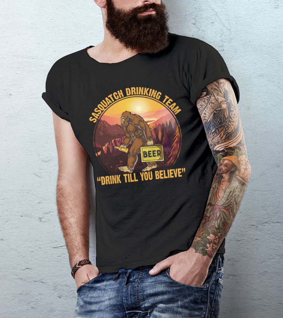Sasquatch Drinking Team Beer Wilderness Sunset Funny Bigfoot Drink Till You Believe T-Shirt