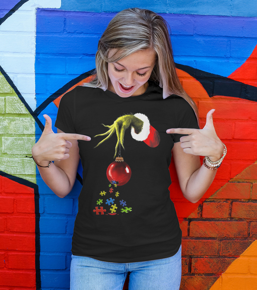 Grinch Hand Holding Red Ornament With Autism Puzzle Pieces T-Shirt