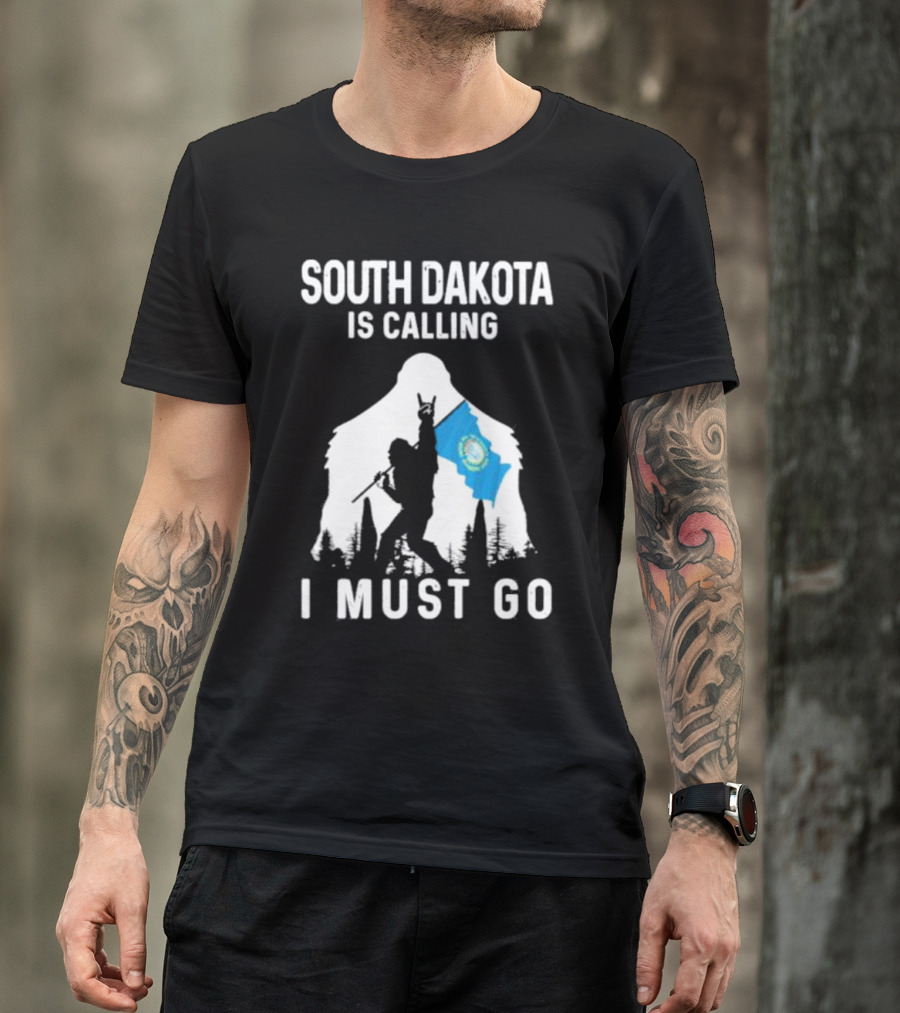 South Dakota Is Calling I Must Go Bigfoot Holding South Dakota Flag T-Shirt
