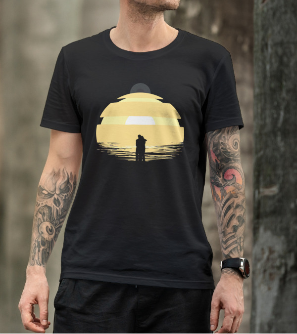 Two Rogues Embracing At Sunset Over Ocean Horizon T-Shirt