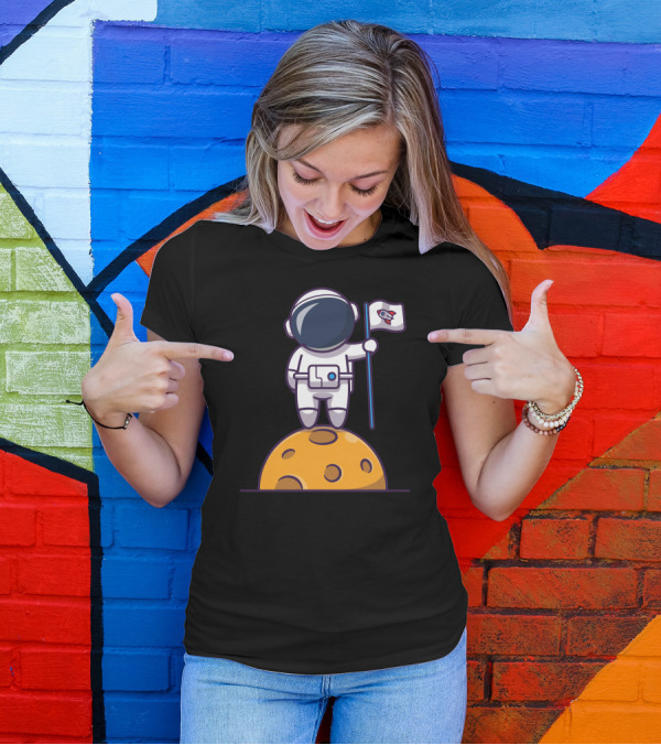 Astronaut Holding Rocket Flag On Moon Surface T-Shirt