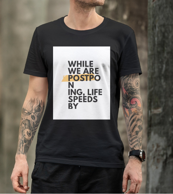 While We Are Postponing Life Speeds By T-Shirt