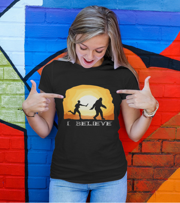 I Believe Bigfoot Crossing Passing Baton Sunset T-Shirt