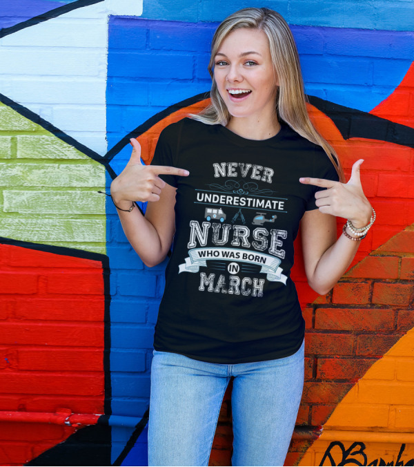 Never Underestimate A Nurse Born In March With Ambulance And Helicopter Icons T-Shirt