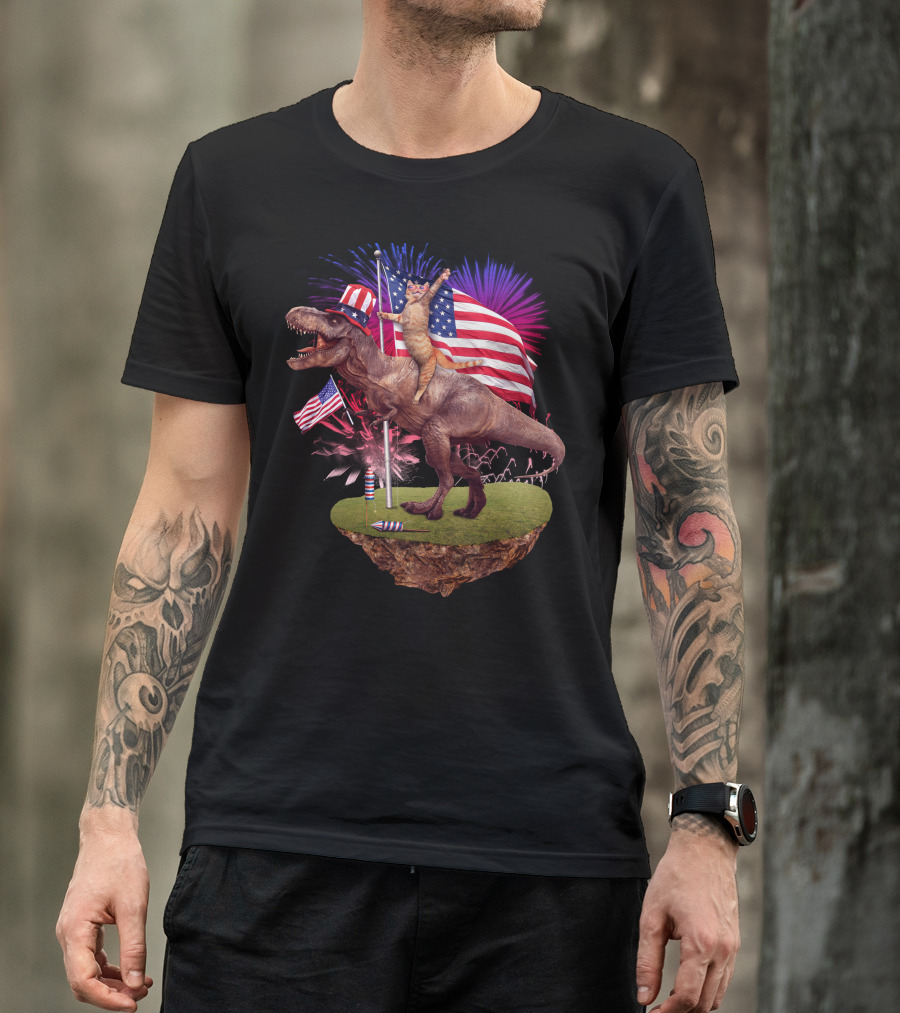 Cat Riding Dinosaur With American Flags And Fireworks For 4th Of July T-Shirt
