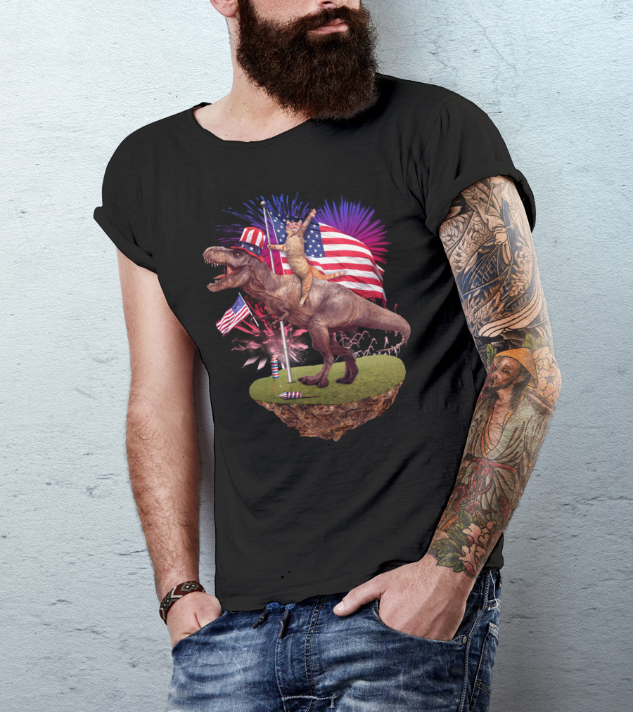 Cat Riding Dinosaur With American Flags And Fireworks For 4th Of July T-Shirt