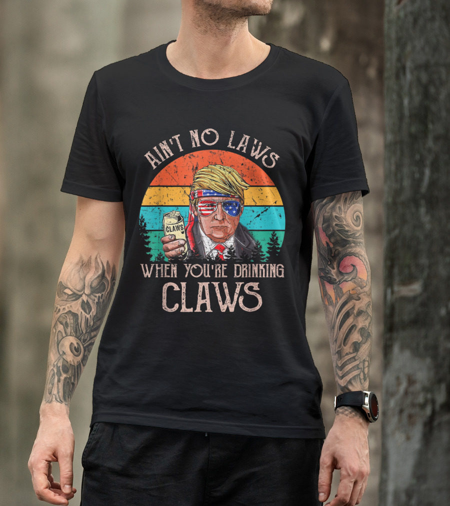Ain't No Laws When You're Drinking Claws Trump Holding Claws Can With Patriotic Sunglasses Retro Sunset T-Shirt