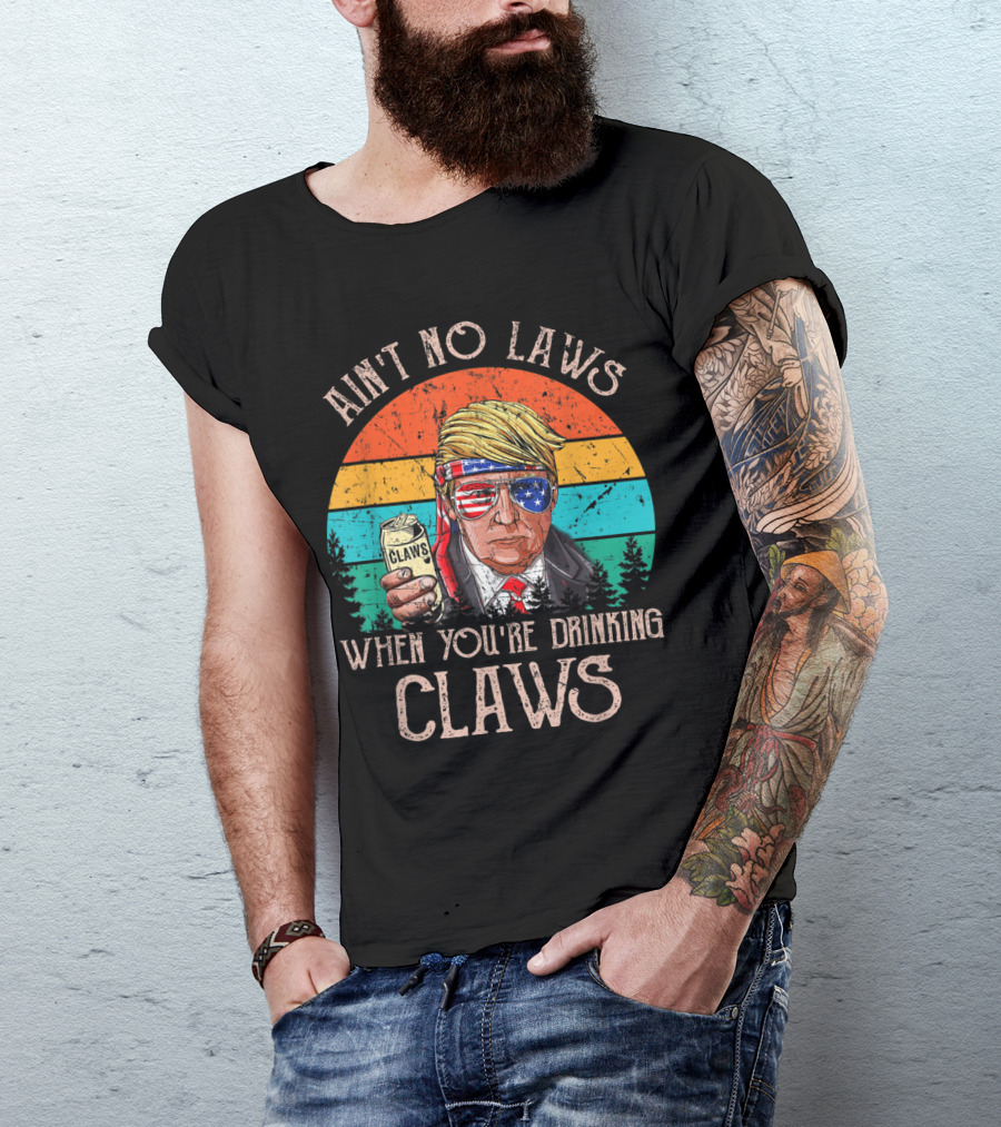 Ain't No Laws When You're Drinking Claws Trump Holding Claws Can With Patriotic Sunglasses Retro Sunset T-Shirt