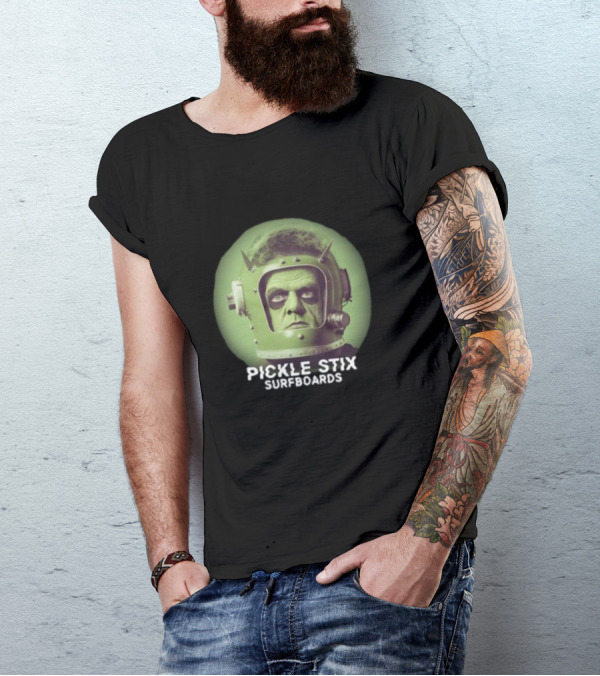 PICKLE STIX SURFBOARDS SPACEMAN HELMET GREEN BACKGROUND T-Shirt