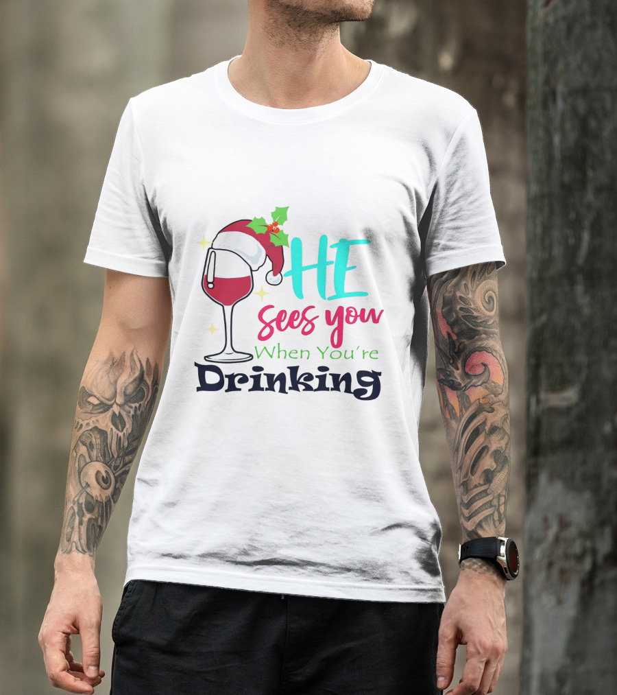 Santa Hat On Wine Glass With 'He Sees You When You're Drinking' Christmas Festive T-Shirt