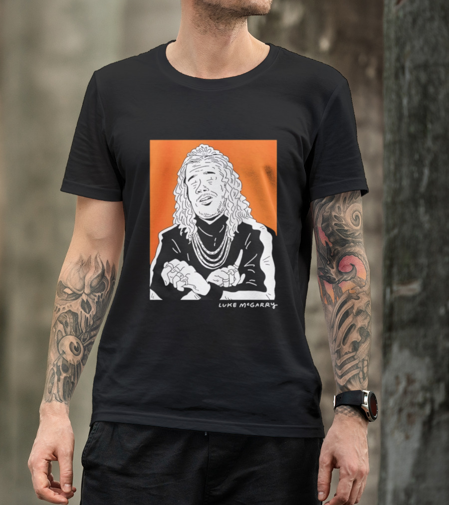 Luke McGarry Cartoon Character With Long Hair And Chains On Orange T-Shirt