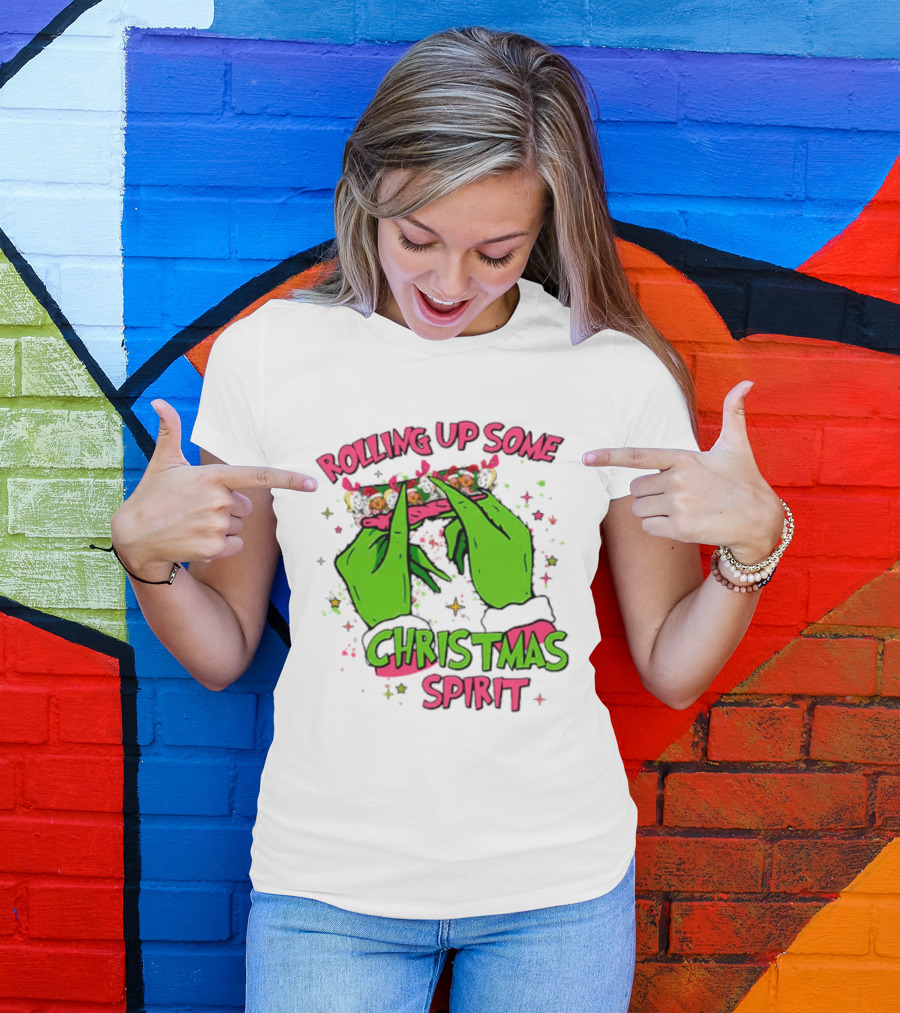 Grinch Rolling Up Some Christmas Spirit With Green Hands And Glitter Stars T-Shirt