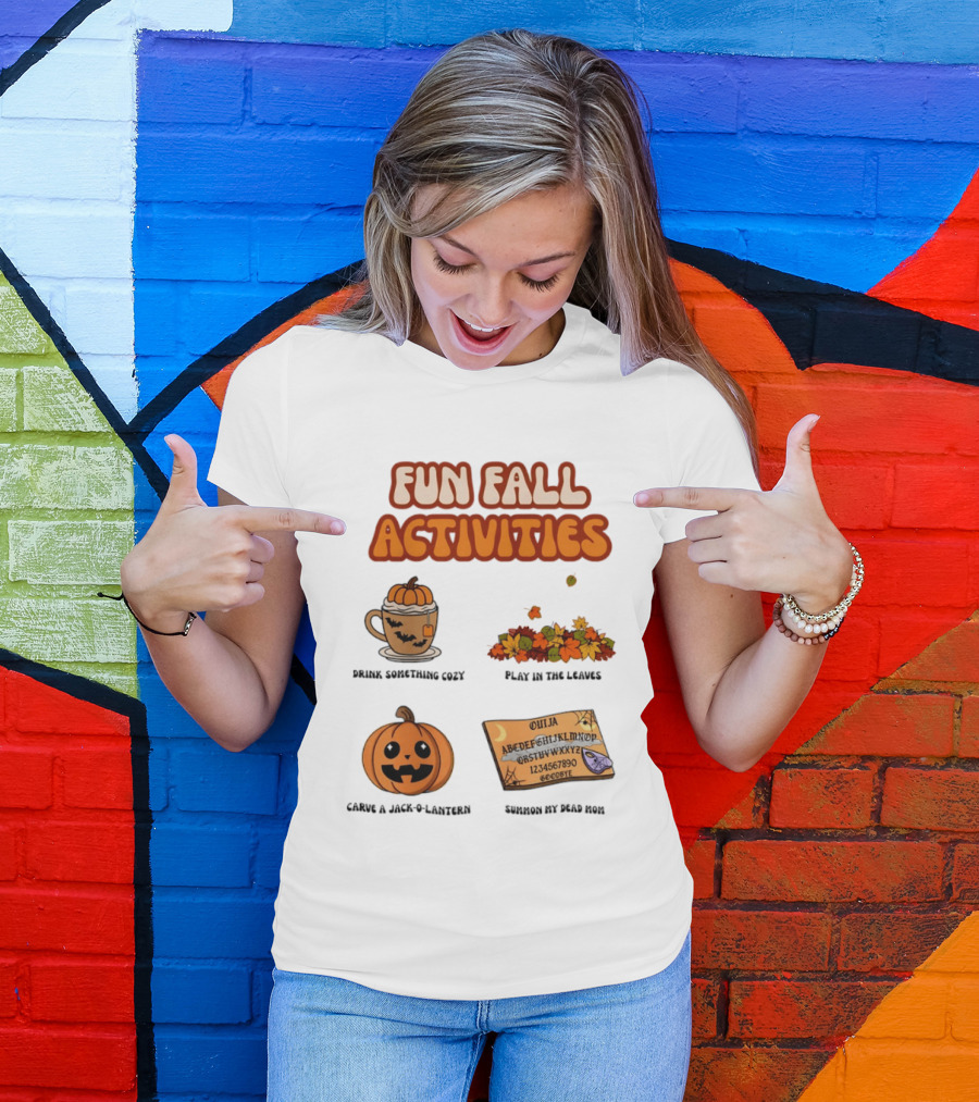 Fun Fall Activities Halloween Drink Something Cozy Ouija Board Carve A Jack O Lantern Play In The Leaves T-Shirt
