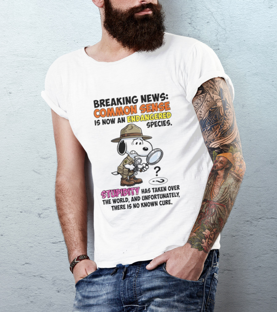 Breaking News Common Sense Endangered Species Stupidity Taken Over Snoopy T-Shirt