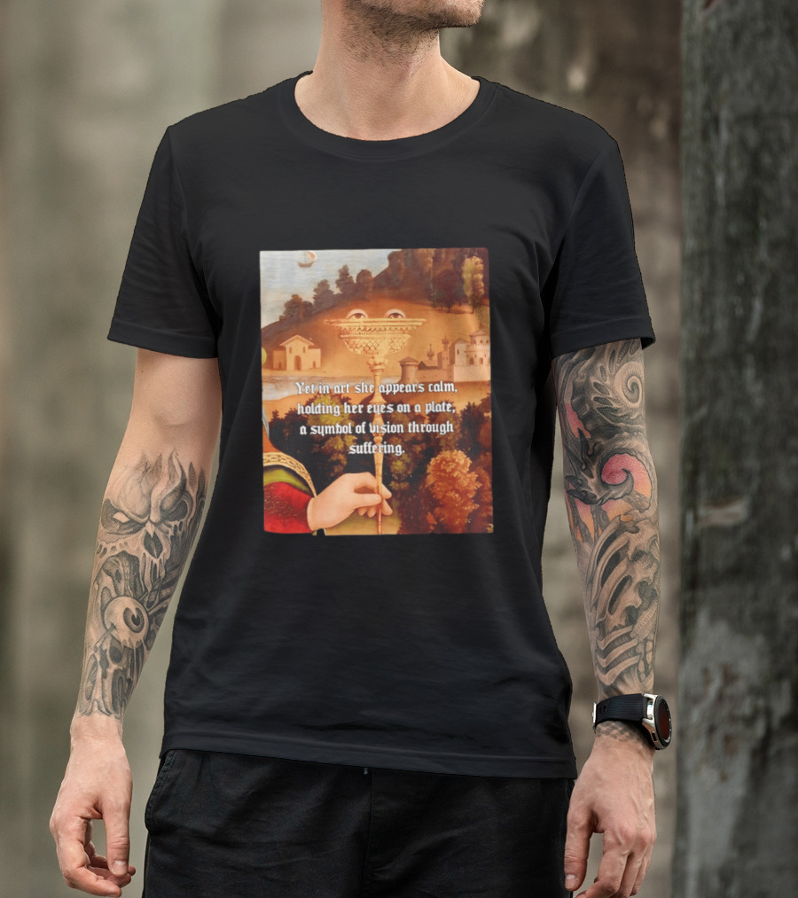 Yet In Art She Appears Calm Holding Her Eyes On A Plate A Symbol Of Vision Through Suffering T-Shirt
