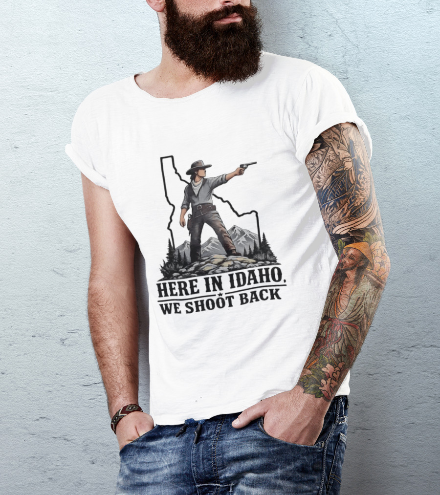 Here In Idaho We Shoot Back Cowboy With Pistol In State Mountains Scene T-Shirt