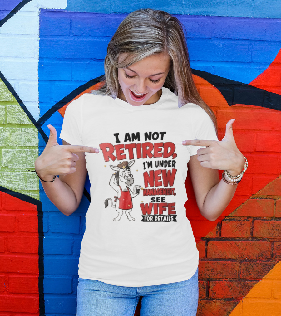 I Am Not Retired I'm Under New Management See Wife For Details Cartoon Donkey Red Apron T-Shirt