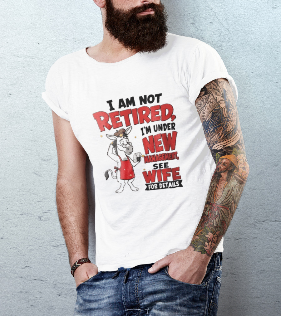 I Am Not Retired I'm Under New Management See Wife For Details Cartoon Donkey Red Apron T-Shirt