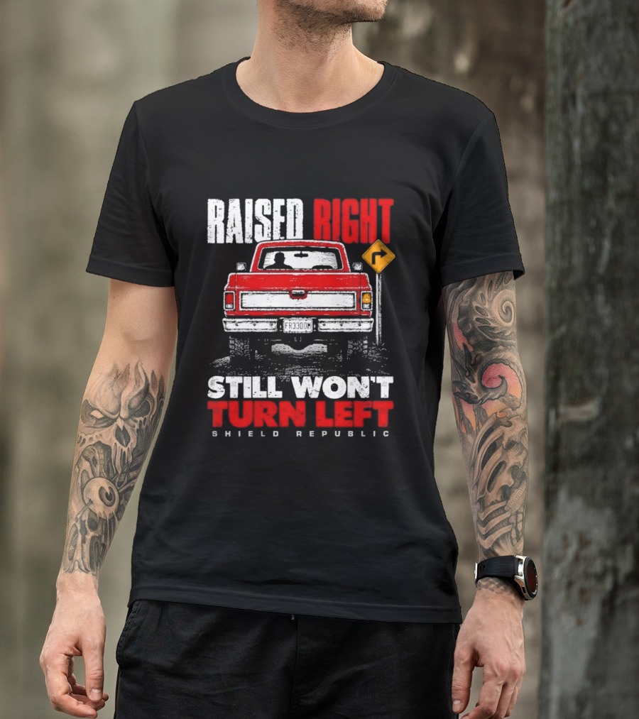 Raised Right Still Won't Turn Left Shield Republic Truck Back View With Right Turn Sign T-Shirt