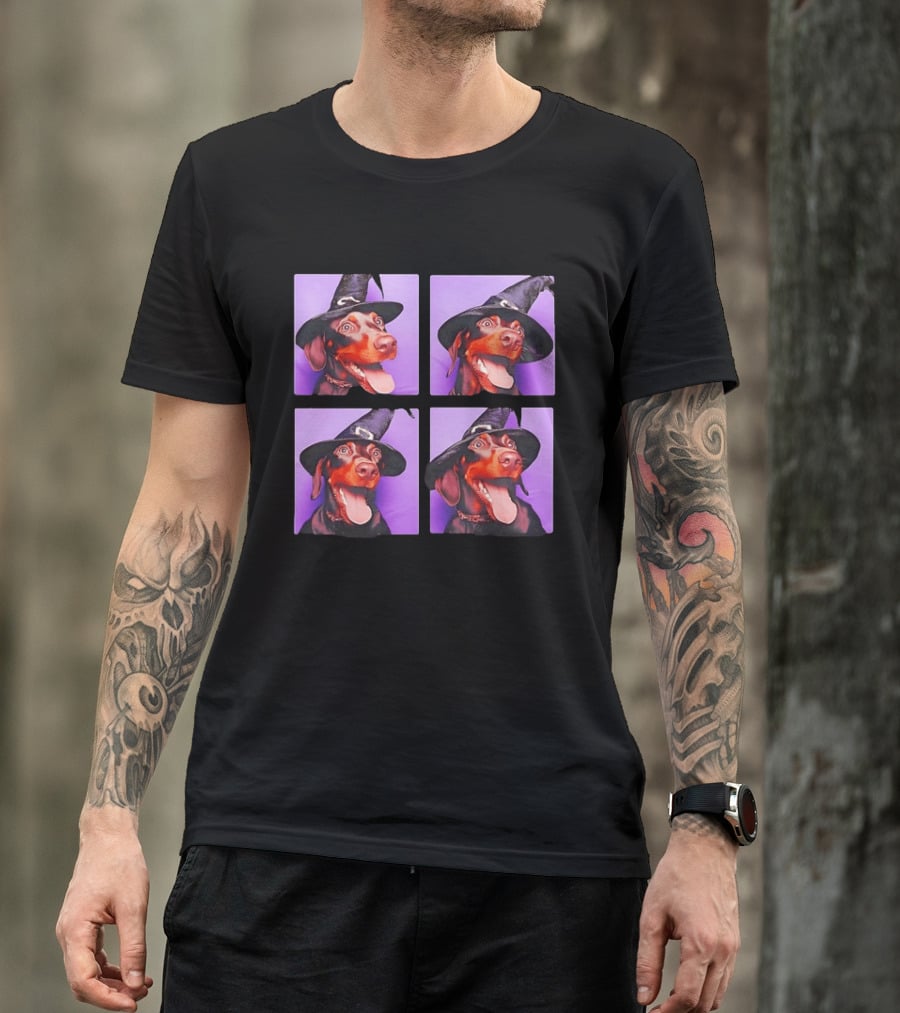 Doberman Pinscher In Witch Hat For Halloween With Purple T-Shirt