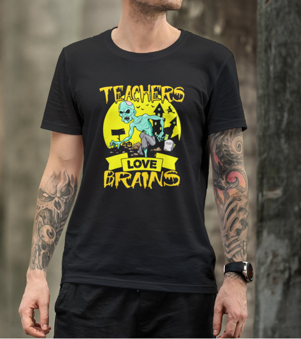 Teachers Love Brains Zombie Halloween Theme With Haunted Houses And Graveyard Background T-Shirt