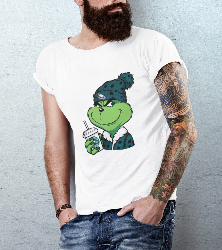 Grinch Holding Cup Wearing Philadelphia Eagles Beanie T-Shirt