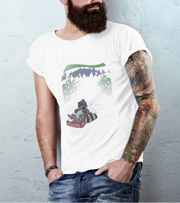 Raccoon Sledding In Winter Forest Scene With Evergreen Trees And Snowflakes T-Shirt