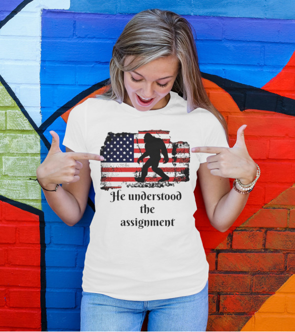 Bigfoot Silhouette With Distressed American Flag He Understood The Assignment T-Shirt