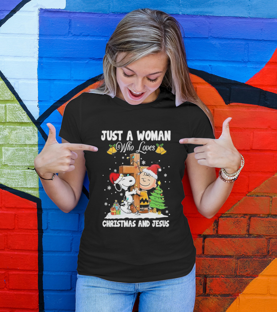 Snoopy Just A Woman Who Loves Christmas And Jesus 2024 Charlie Brown Hugging Cross Santa Hats Snowflakes T-Shirt